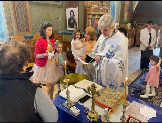 O fetiță din Ucraina a fost botezată la parohia Sf. Nicolae-Andronești